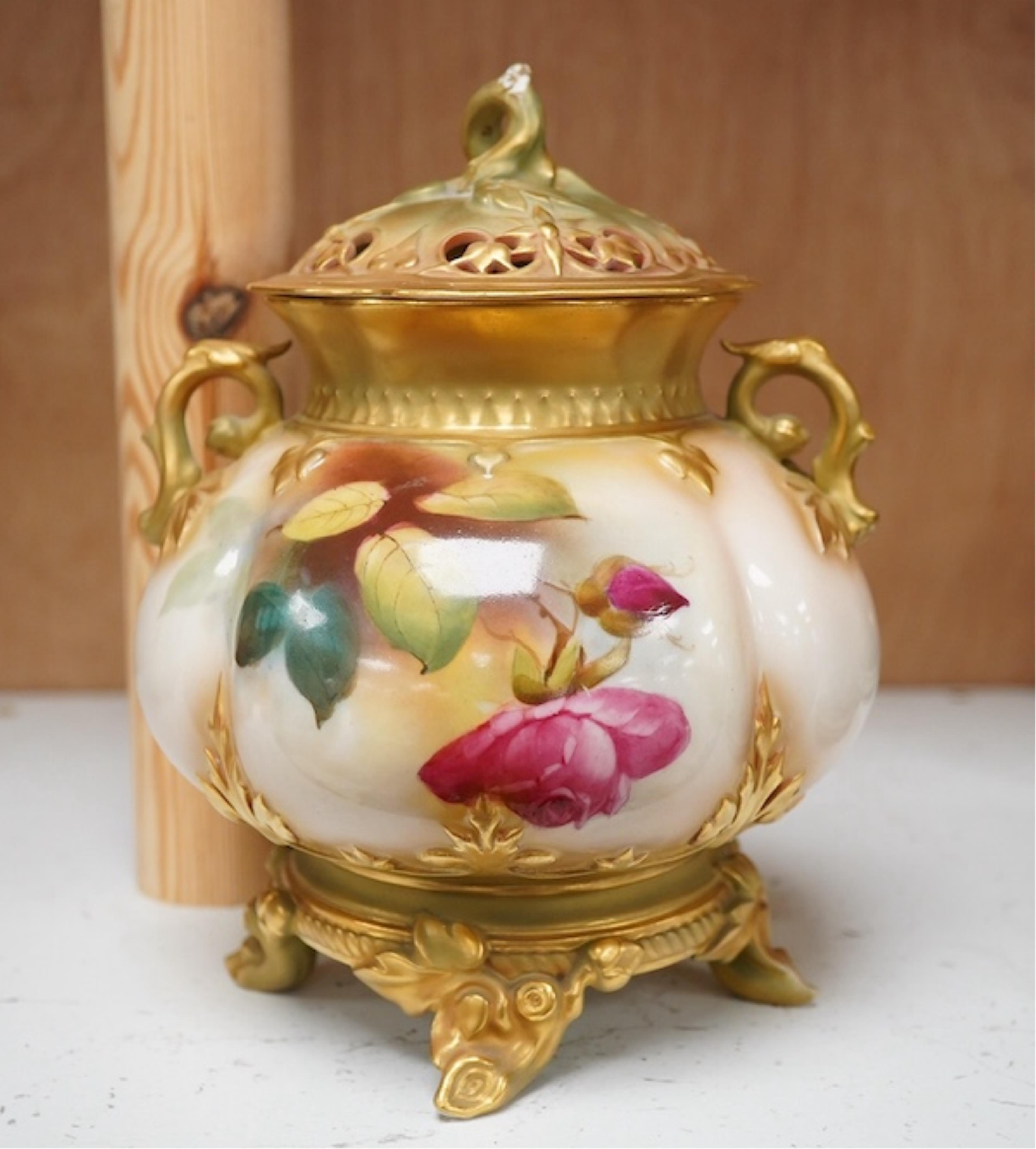 A Royal Worcester rose decorated pot pourri, 19cm high. Condition - handle to cover damaged